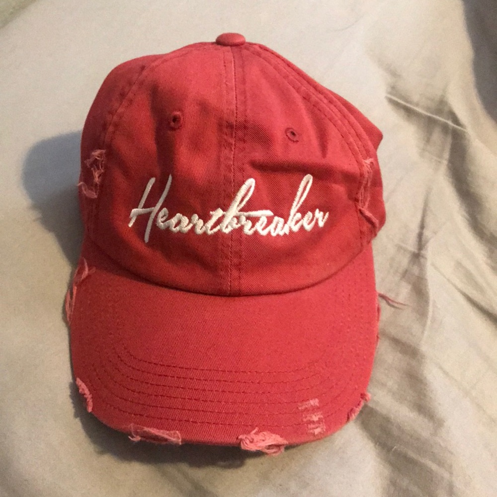 Red distressed baseball cap